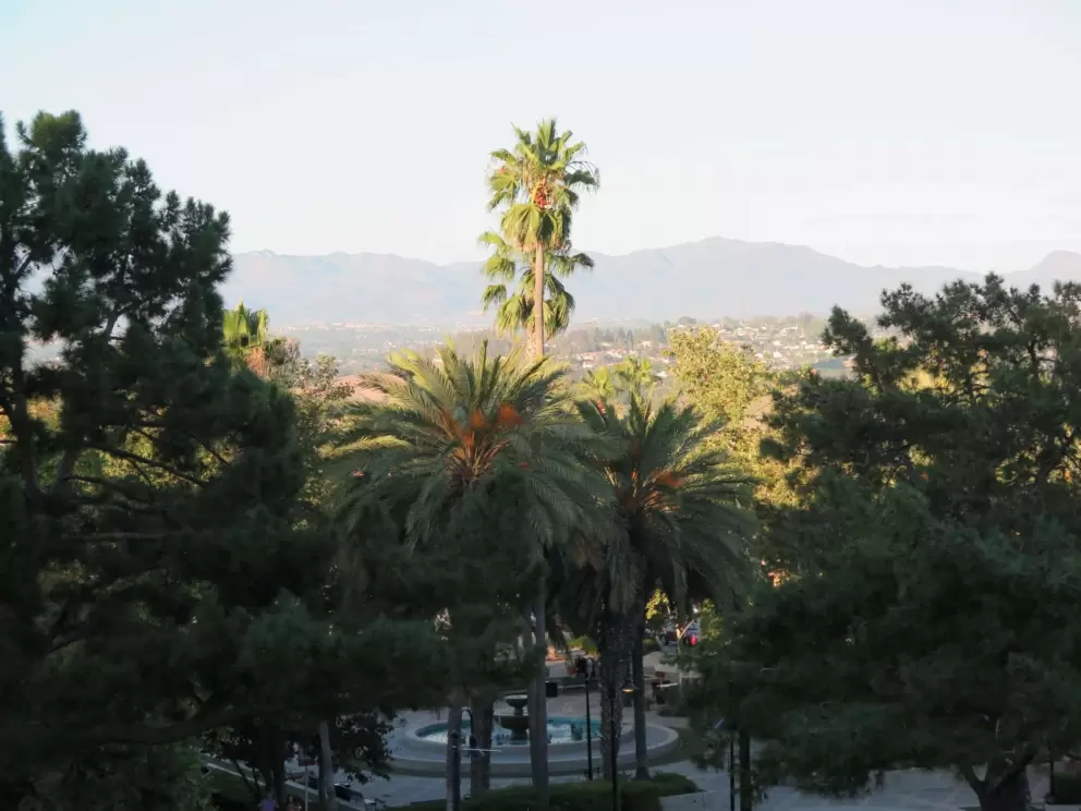 The fountain and mountains behind, as seen from Grand Park. 