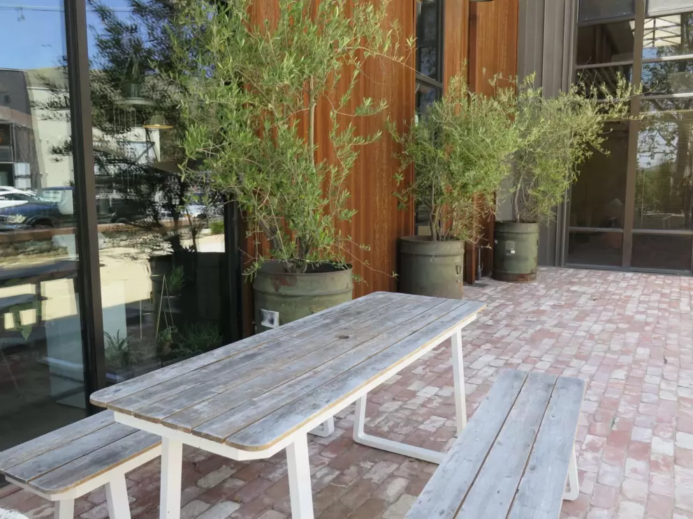 Picnic table outside KBRG Coffee Lab at Duncan Alley.