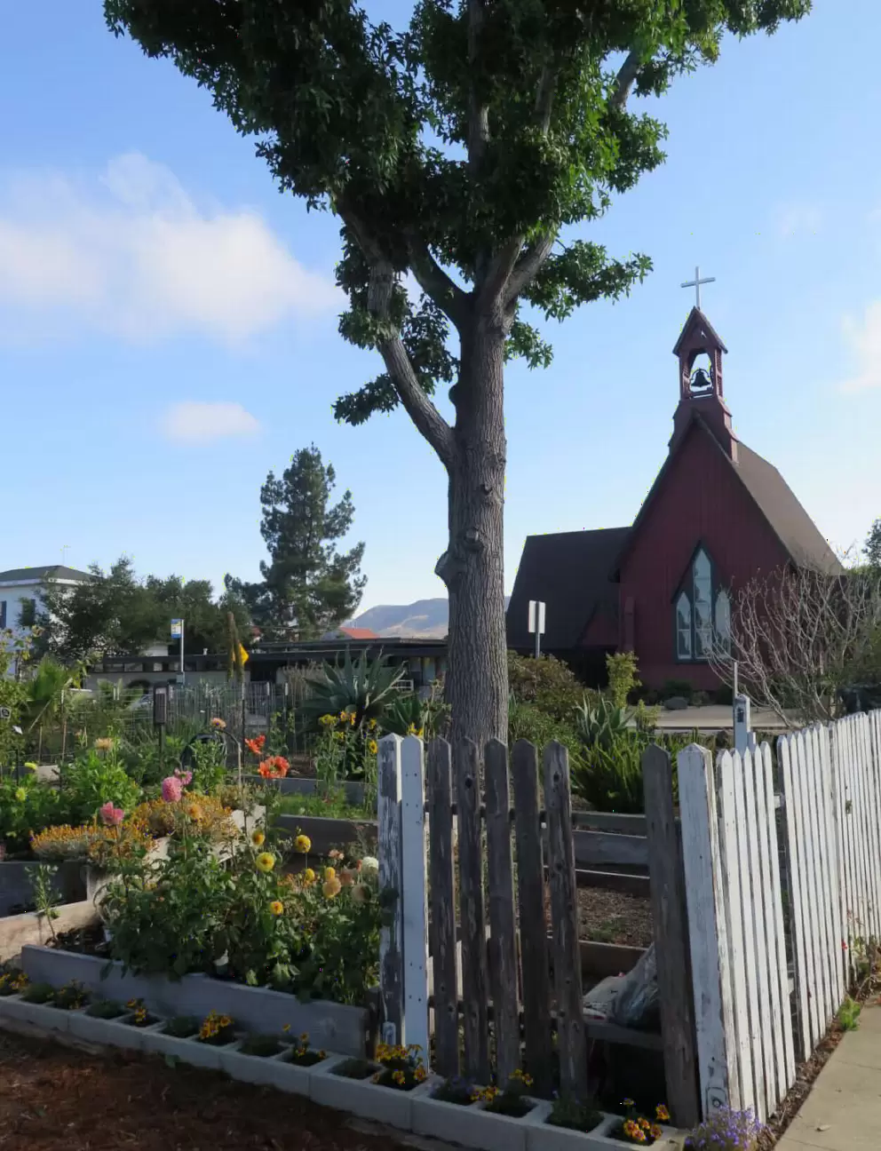 Saint Stephen's Episcopal Church looks adorable from the community garden at Emerson Park. 