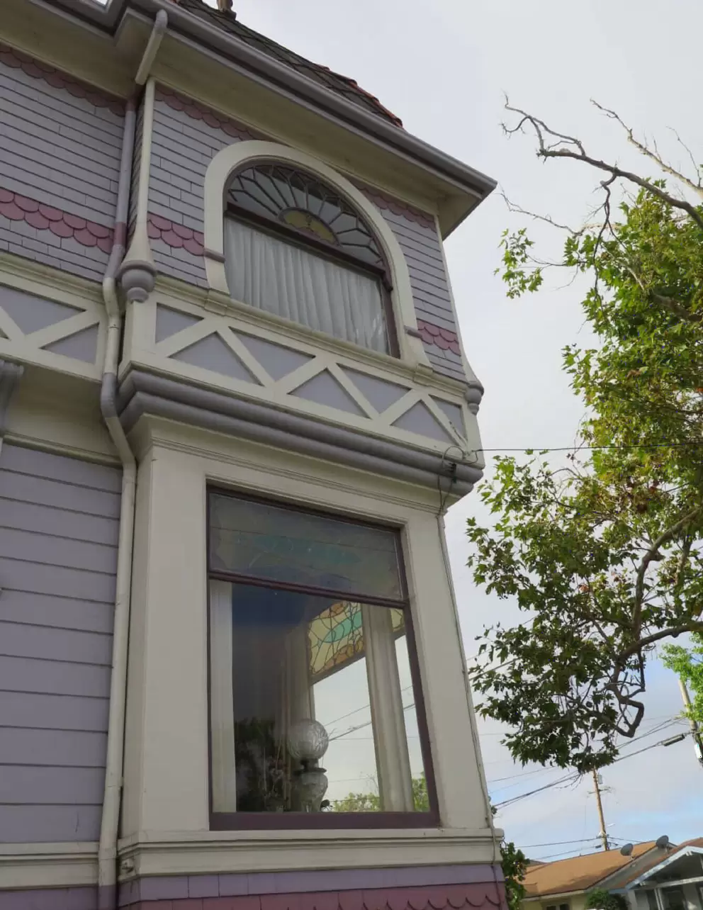Pink house with squared bay window on Buchon and Broad Streets. 