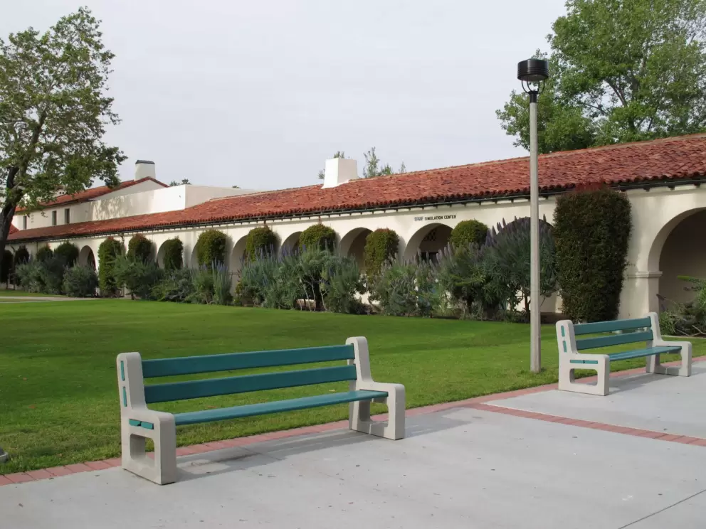 Pleasant bench in courtyard behind Hepner Hall.