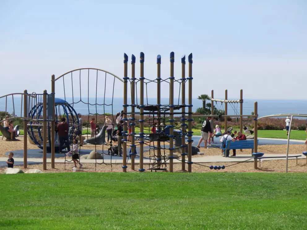 The playground has a sphere spinner, tightrop with four balls on it, and rope climbies to spare!
