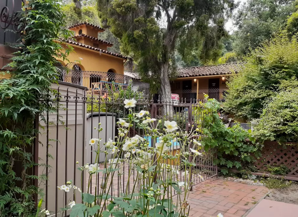 Flowers and Spanish architecture at Sycamore Mineral Springs Resort. 