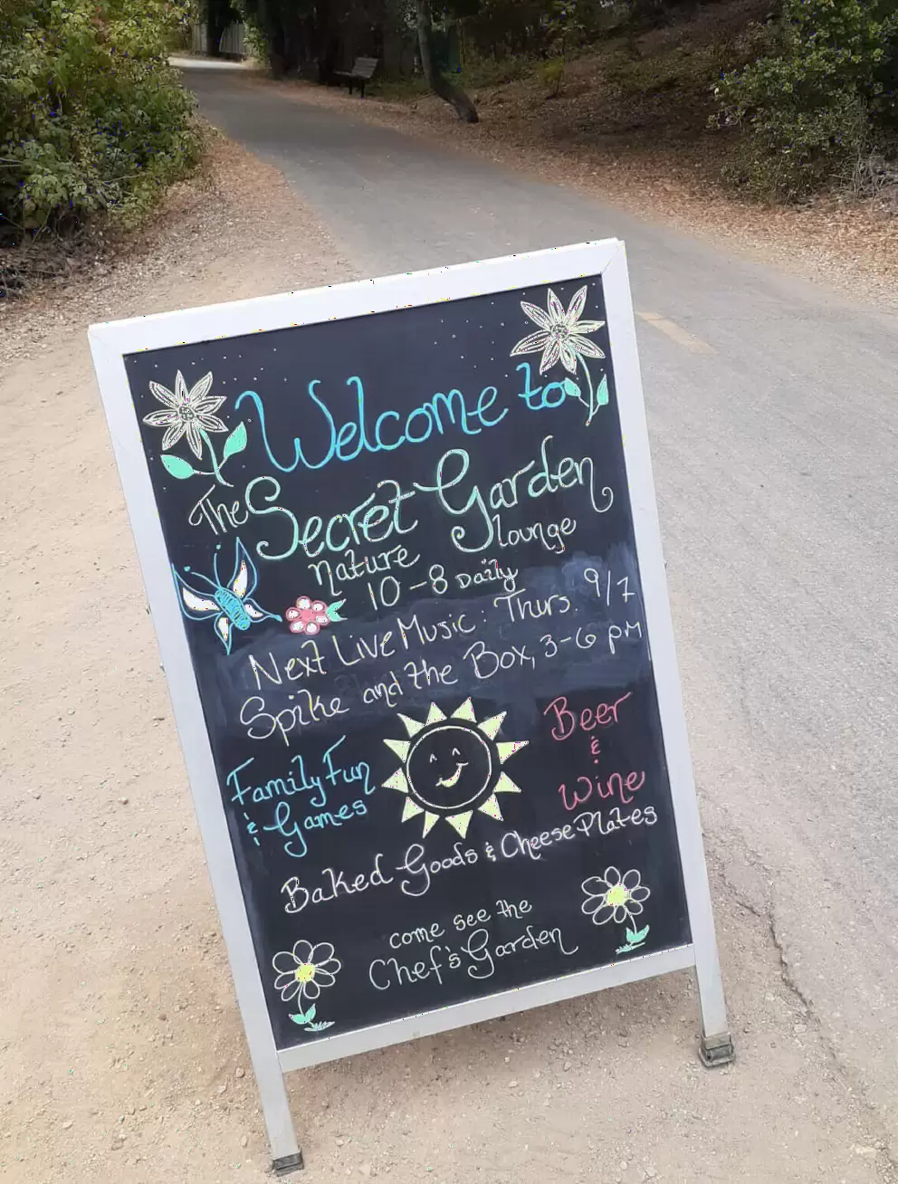 Sign beckoning you to check out the Secret Garden at the Sycamore Mineral Springs Resort, accessed from the trail. 