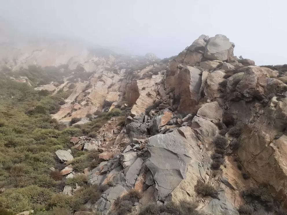 Morro Rock, shrouded in fog, around the corner from the beach. 