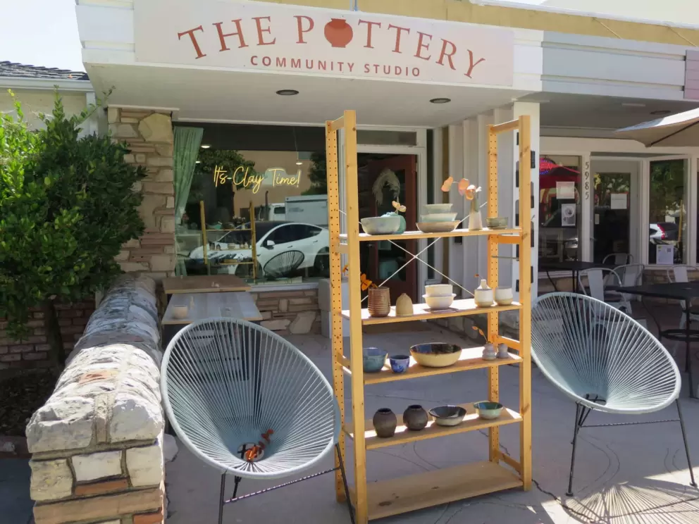The Pottery Community Studio, with ceramics outside. 