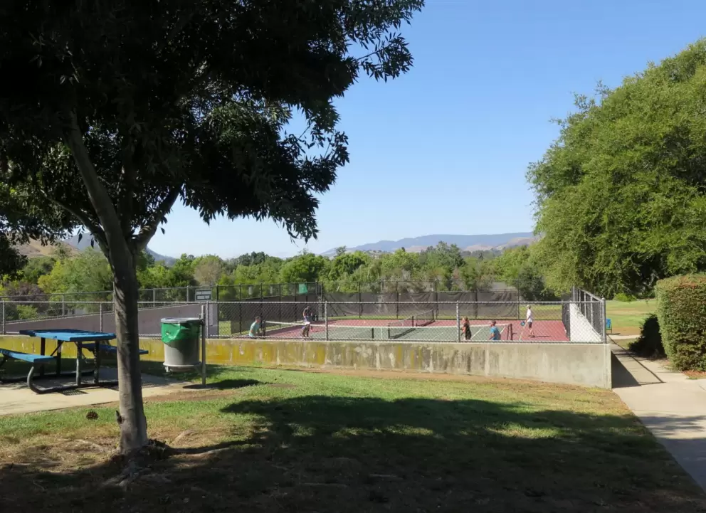 Pickleball courts and picnic table. 