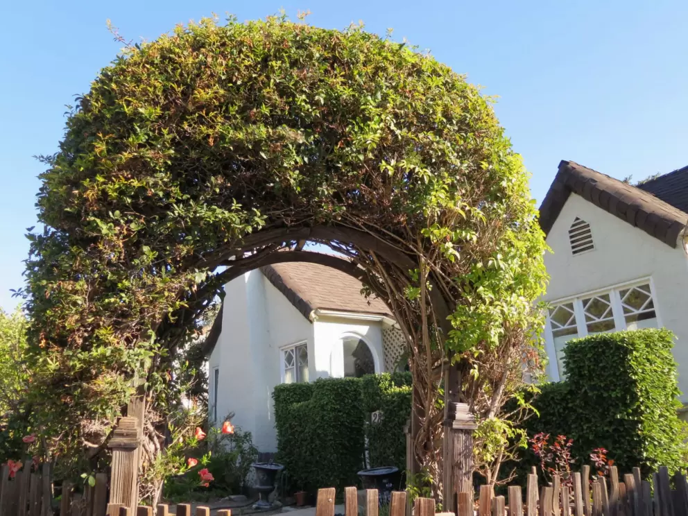 Archway in front of a historic home. 