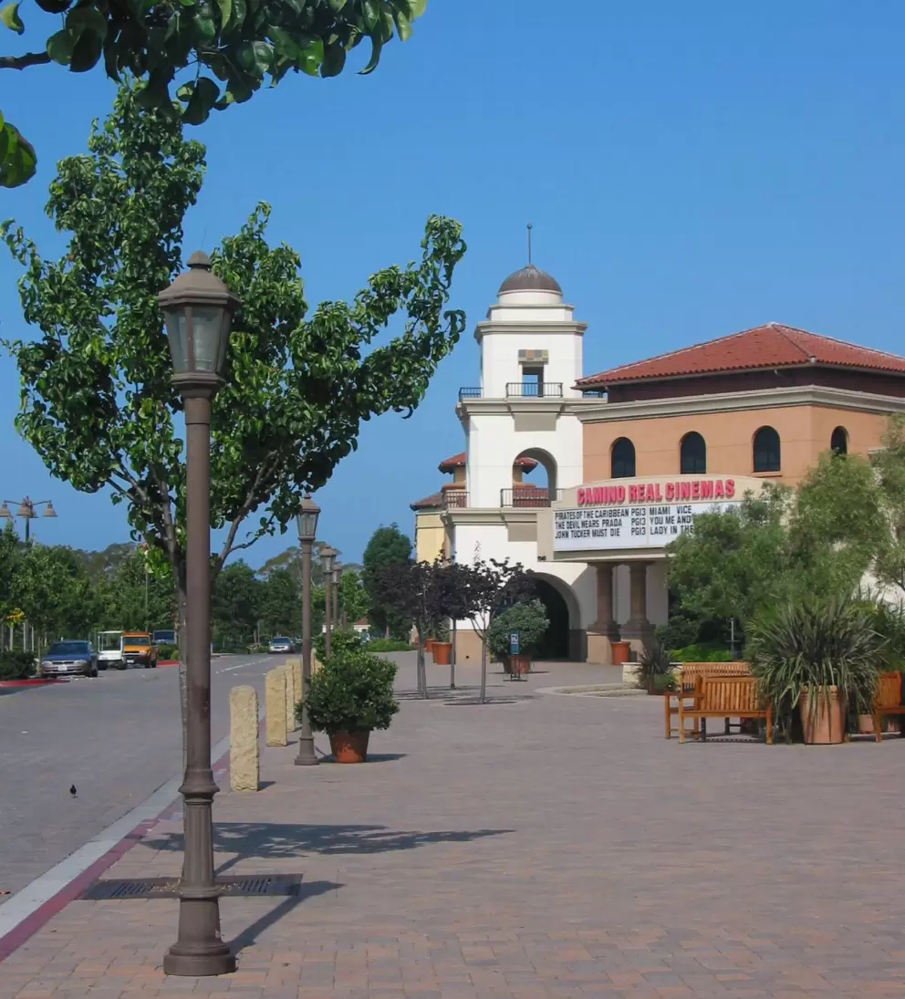 I love the Spanish-style tower, classic lampposts, and deciduous trees at Camino Real Shopping Center!
