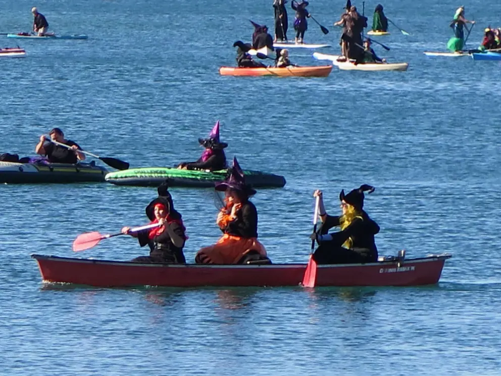 Three witches paddling. 