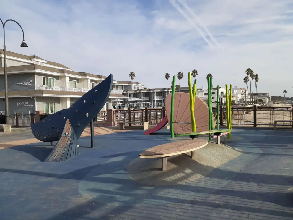 The playground has a surfboard you can stand on. 