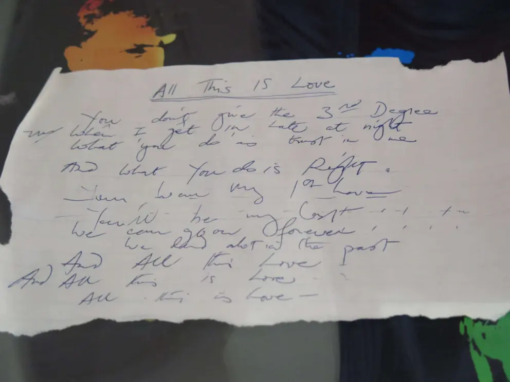 Hand-written song lyrics to All This Is Love. 