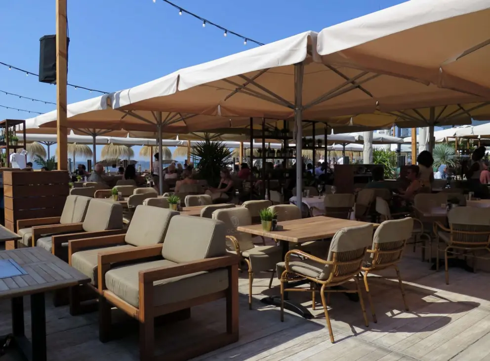 Summertime cafes along the sand. 
