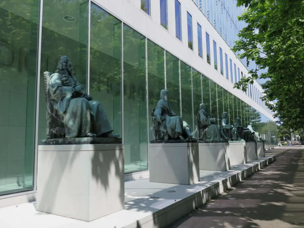 Statues of justices outside Supreme Court in Korte Voorhout nearby. 