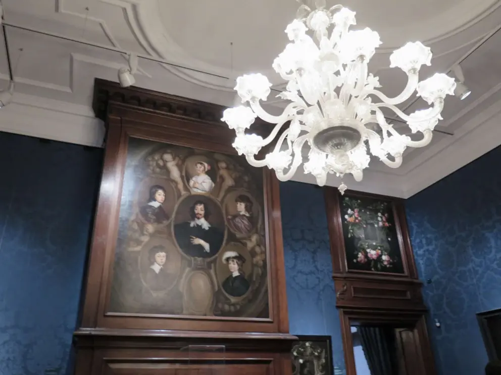 Chandelier and portraits. 