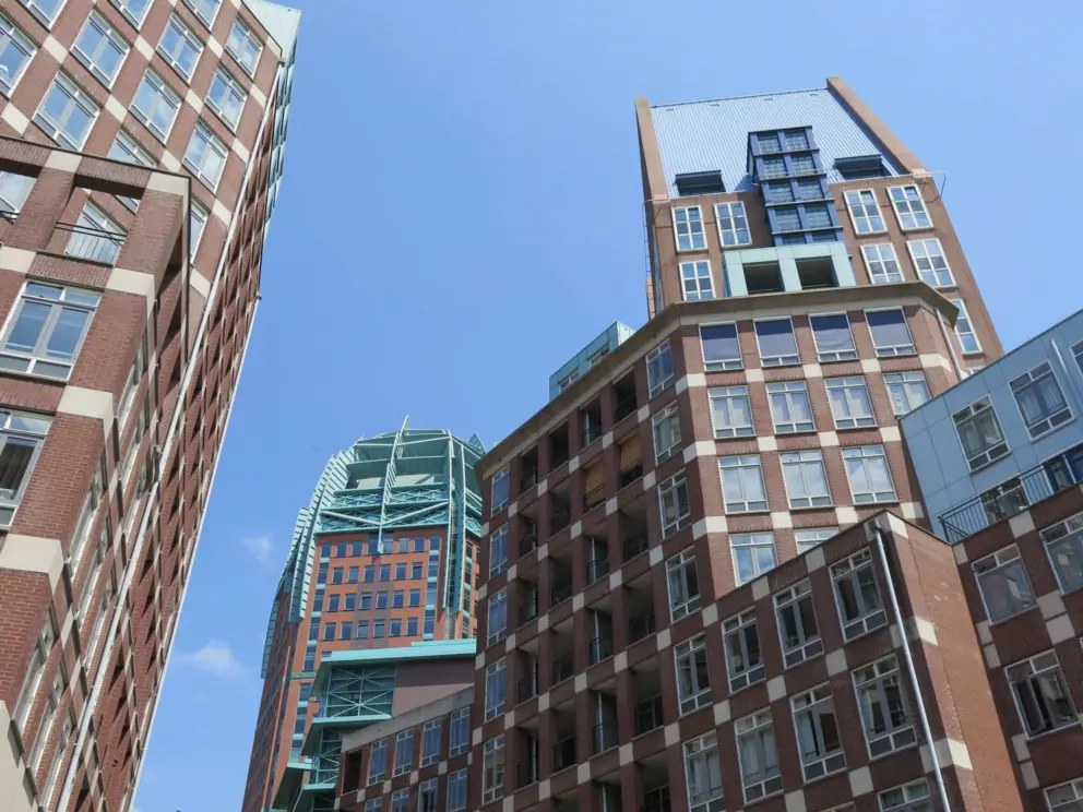 Skyscrapers with pretty colors and designs, as seen from Muzenplein. 