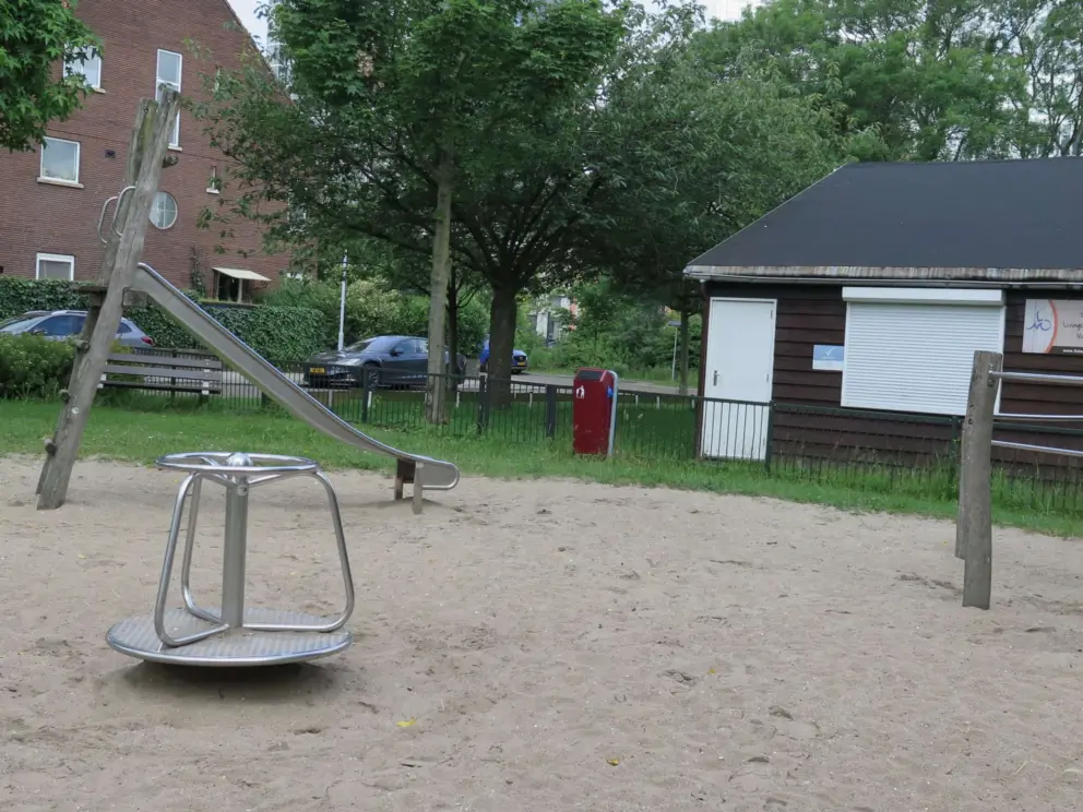 Metal spinner and slide. 