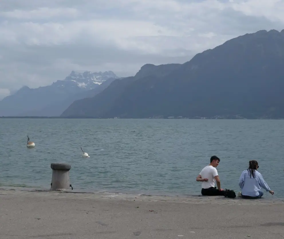Sitting by the waterfront. 