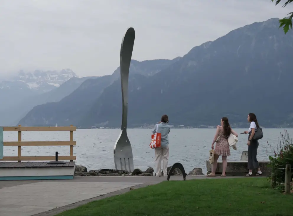 Visitors check out The Fork, rising out of the lake!