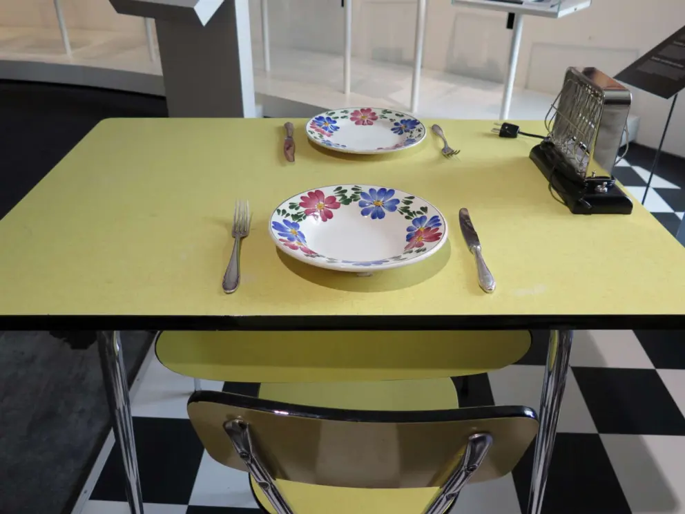 Table where your kids can pretend to serve you food in the kitchen.