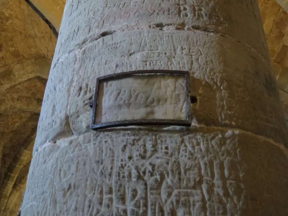 Byron's name engraved in a post. 