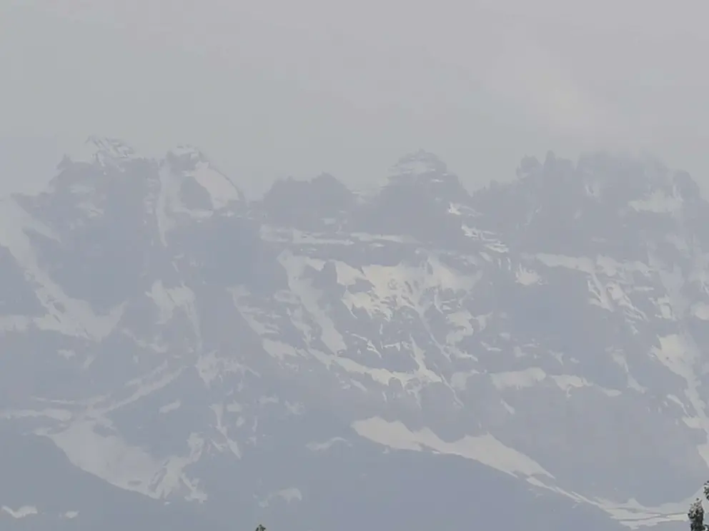 The snowy mountain peaks you see from the town. 