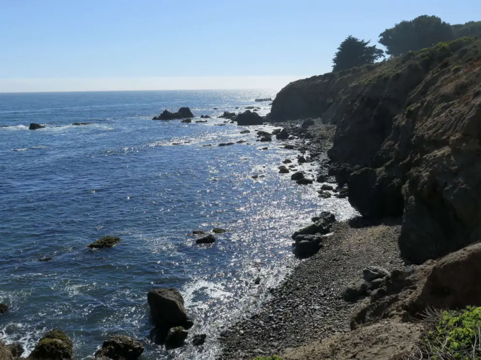A pebbly beach that you can see below. 