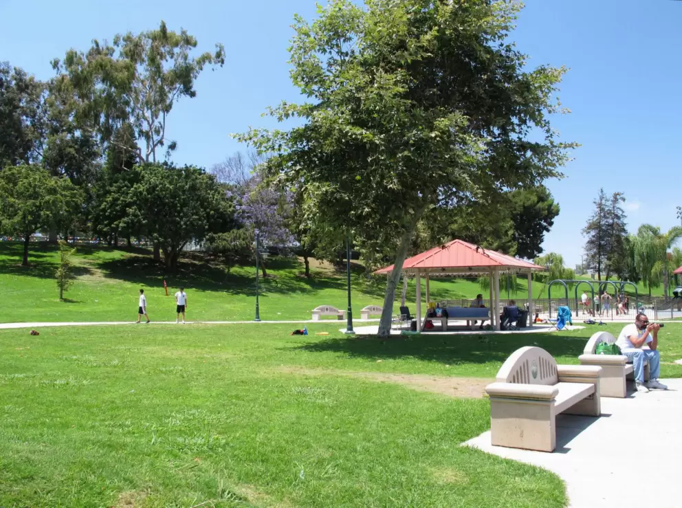Gazebo, benches, and huge lawn by the lake.
