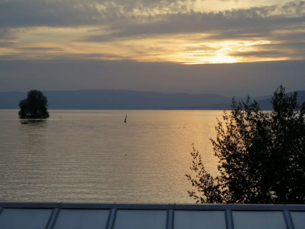 The little island in Lake Geneva, at sunset. 