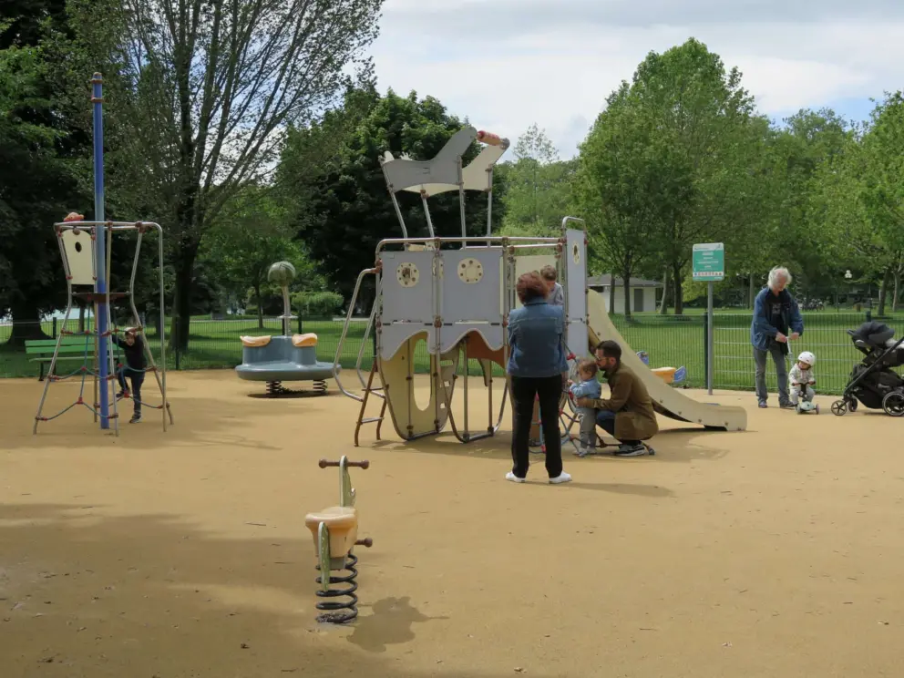 Horse bouncy, tower climby, spinner, ship climby, and slide at toddler playground at Parc Charles Bosson. 