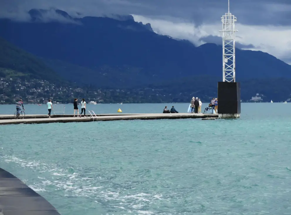 The huge dock at Plage de l'Imperial, with mysterious mountains behind. 