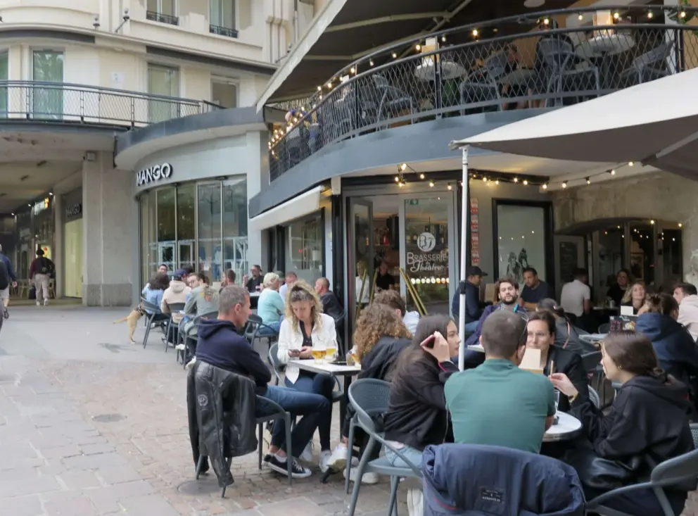 Sitting outside at Brasserie du Theatre. 