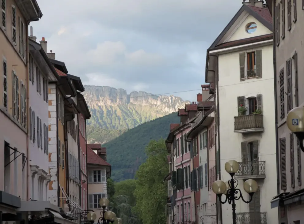 The mountains behind the town. 
