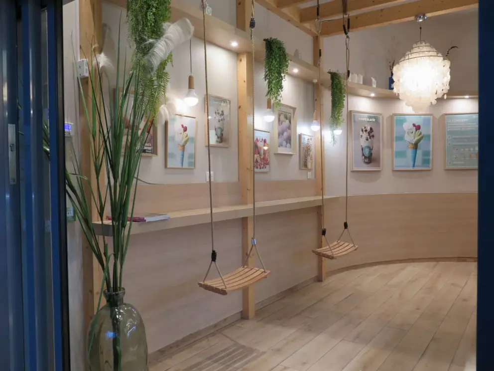 Glace Room, an ice cream shop with modern decor and swings. 