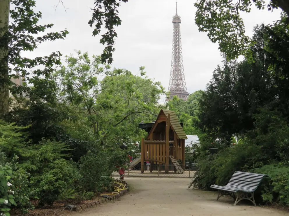 Wooden play house and Eiffel Tower views at Square d'Ajaccio, across the boulevard and slightly north of Musee Rodin. 