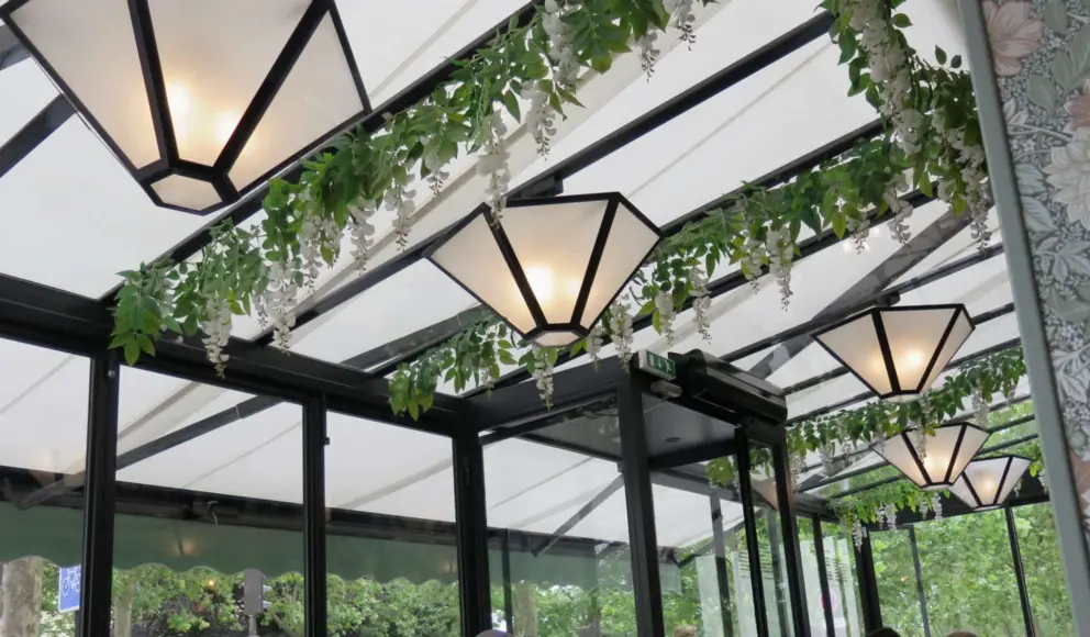 The ceiling and leafy views from Le Cafe du Musee.