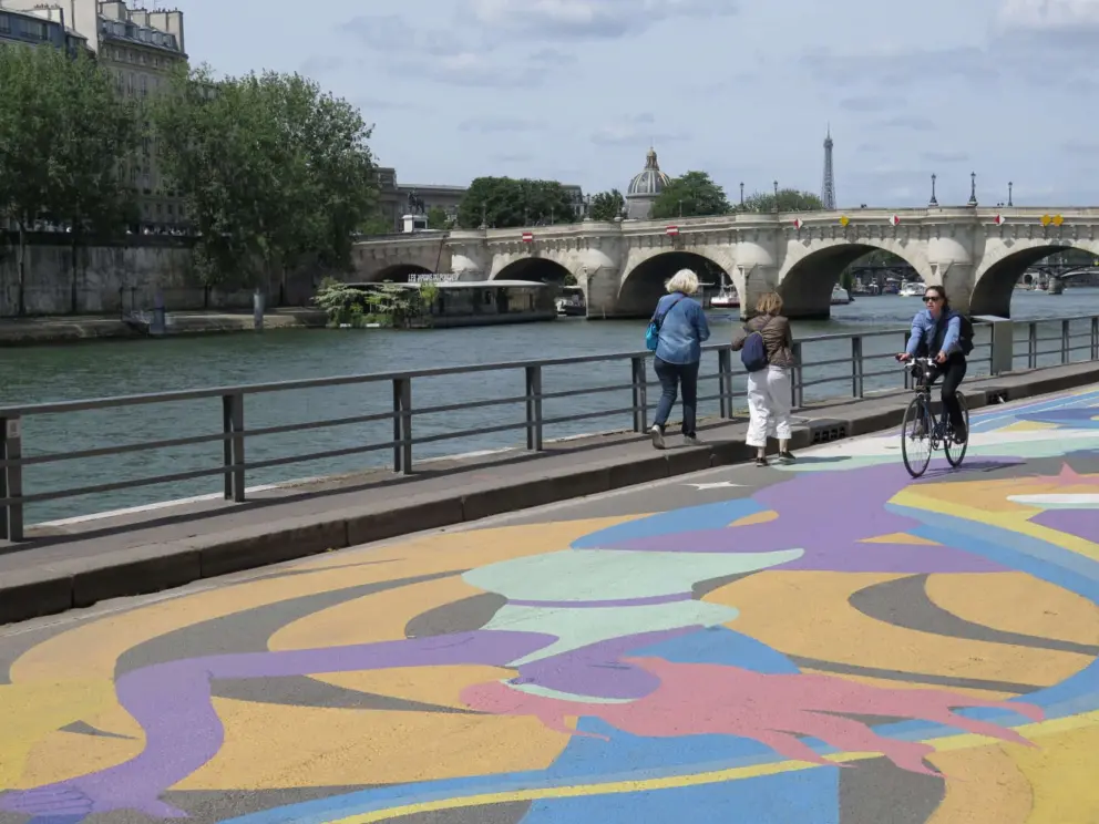Colorful patterns on the promenade near Pont Neuf, before the 2024 Olympics. 