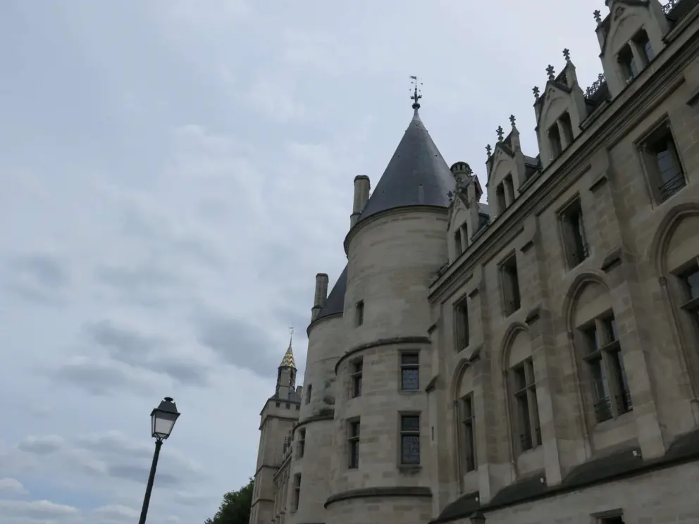 Looking up at a turret at the Conciergerie. 