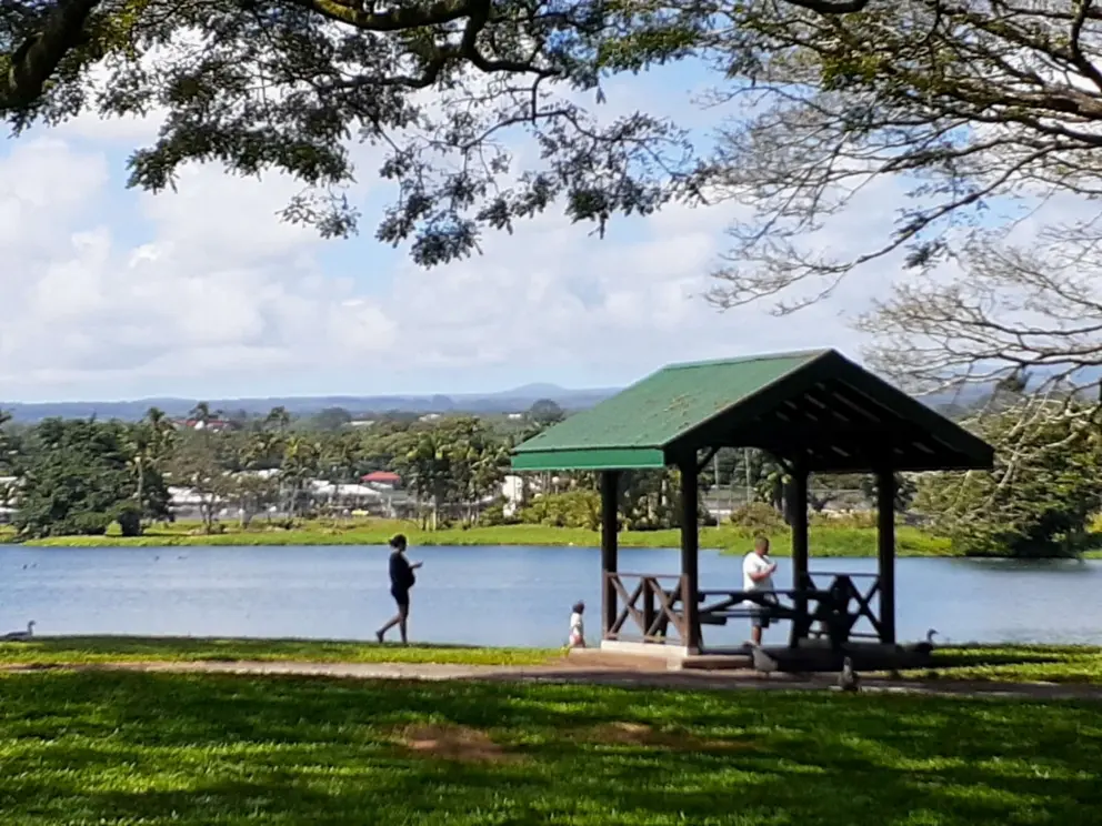 A picnic gazebo by the water. 