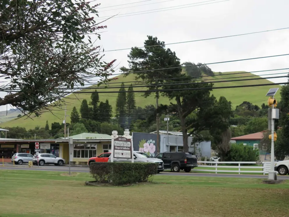 Green hills and mural in Waimea town, across the street from Parker Square. 