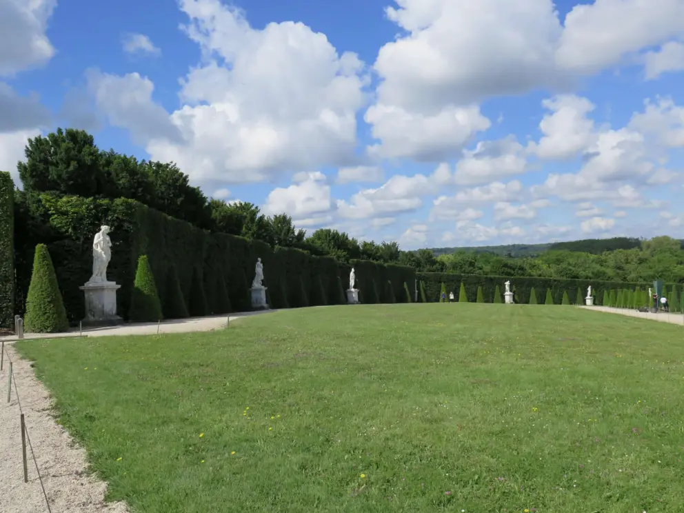 Sculptures around a lawn.