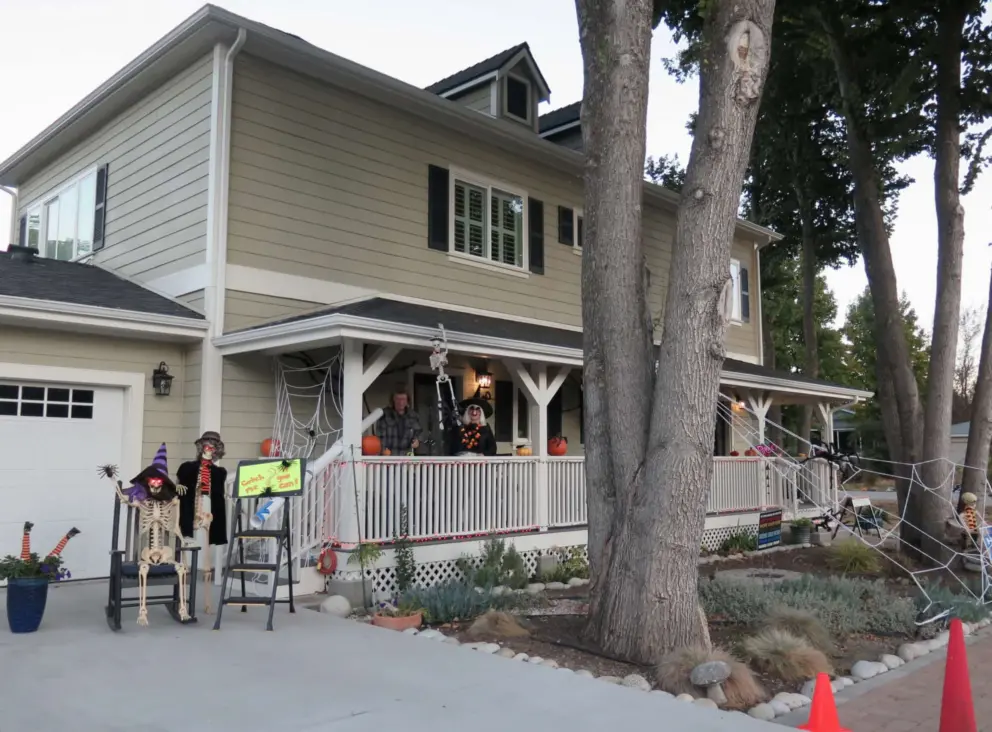 A house with a charming balcony, on Halloween. 
