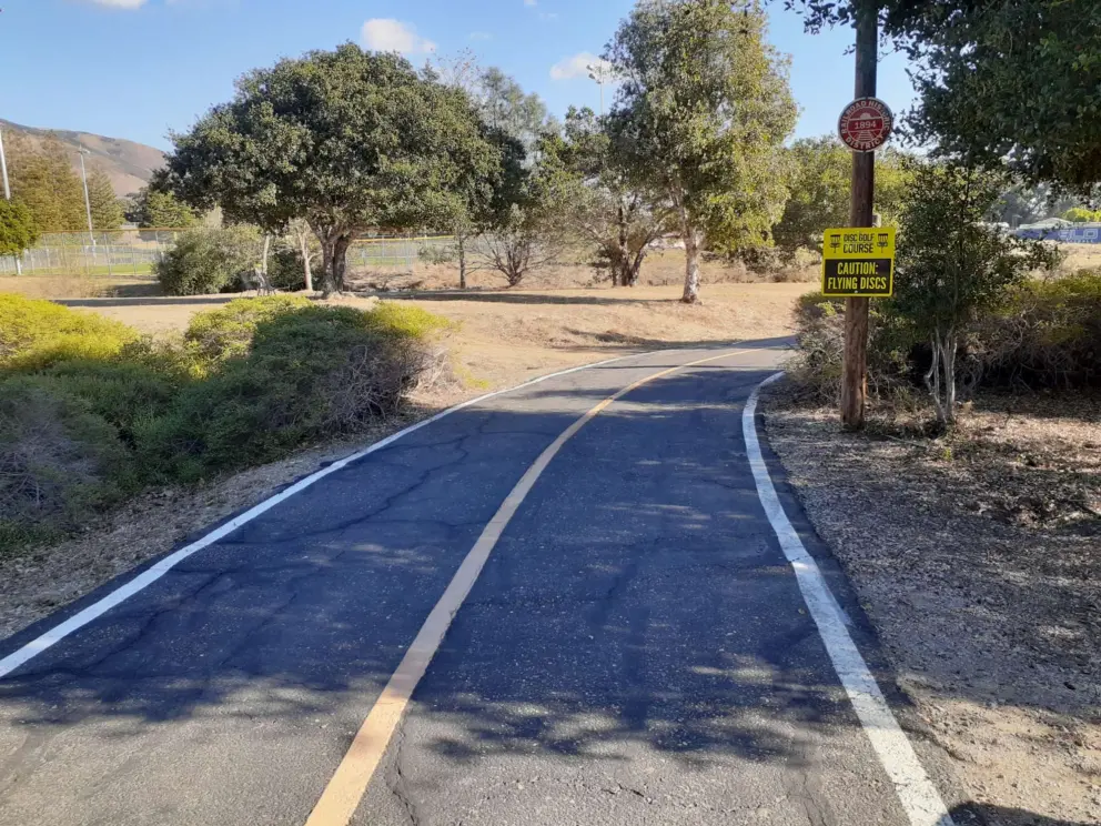 Some shade on the bike path, by the frisbee golf course at Sinsheimer Park. 