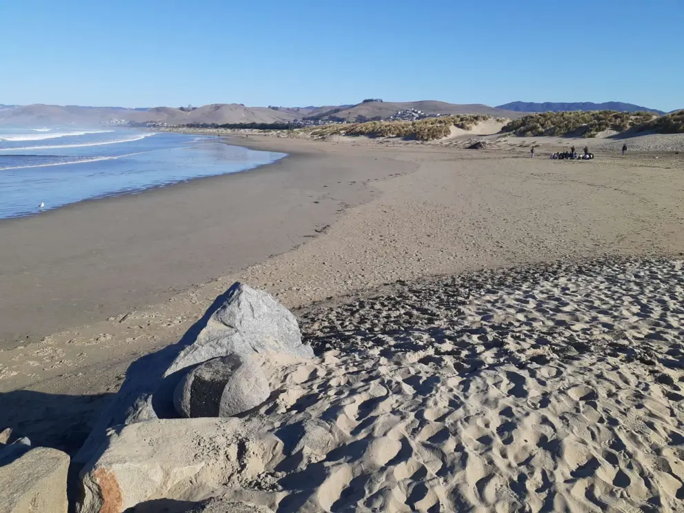 The soft sand you walk down to get onto the beach. 