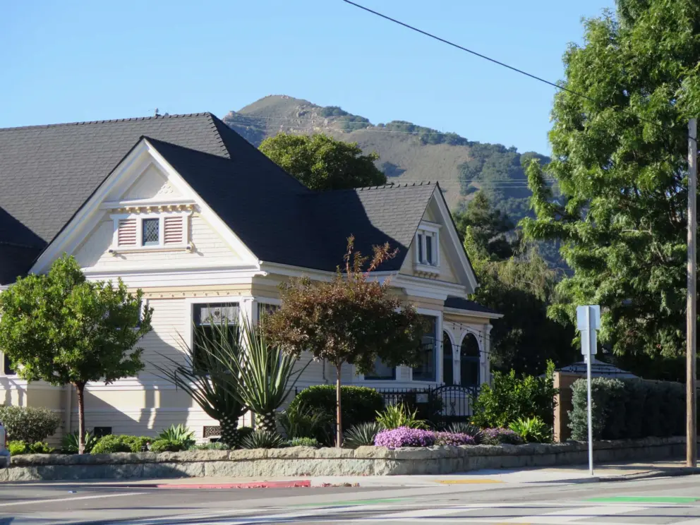 Sweet Victorian home, with Cerro San Luis behind. 