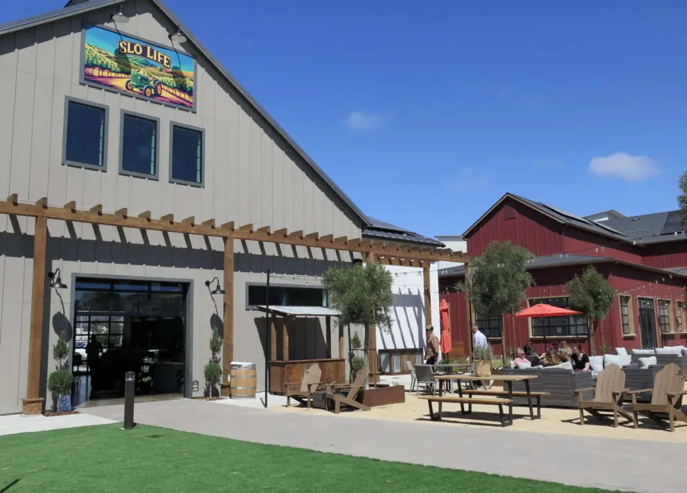 The back of the market, and a huge outdoor public space with seating. 