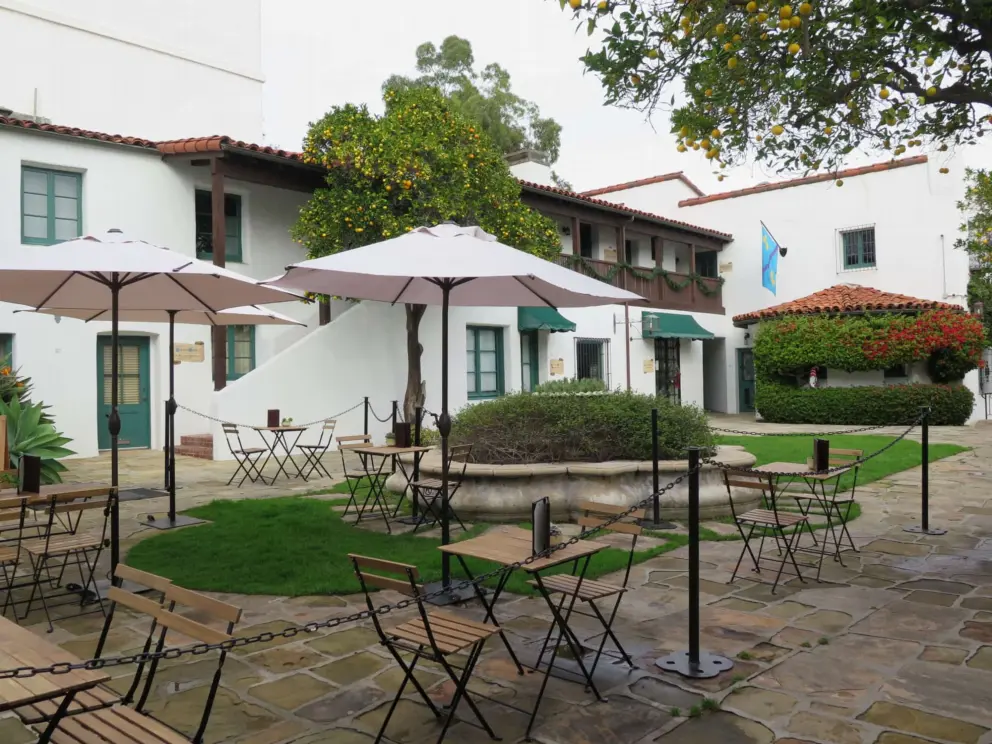 Chairs and tables in the courtyard. 