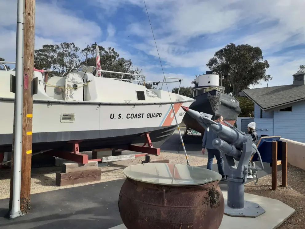 U.S. Coast Guard boat, and whaler's trypot from the 1880s. 