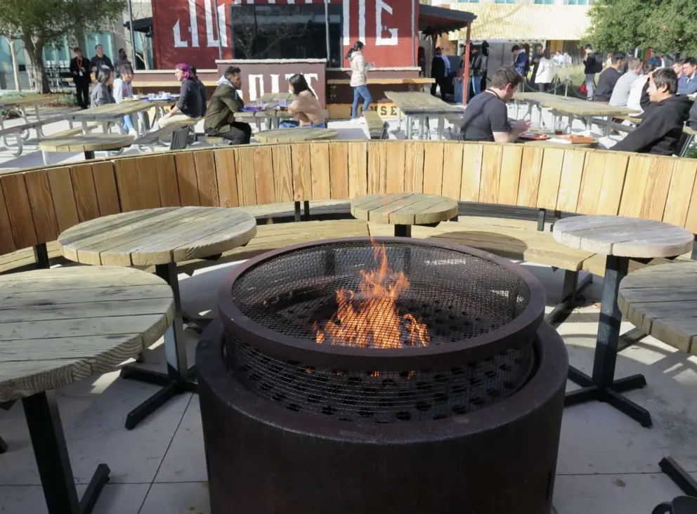 A fire pit and sunny seating. 