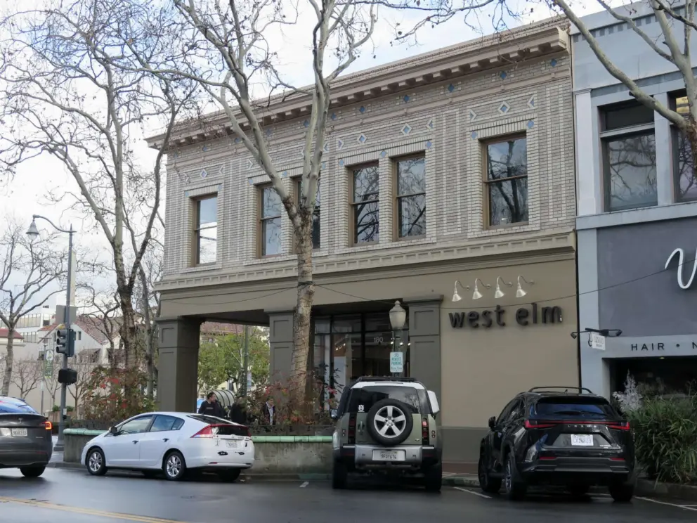 A beautiful historic storefront with detailed decoration.